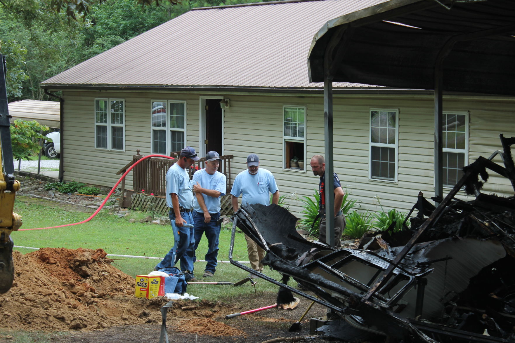 A team of Elk River employees at Meadowwood fire